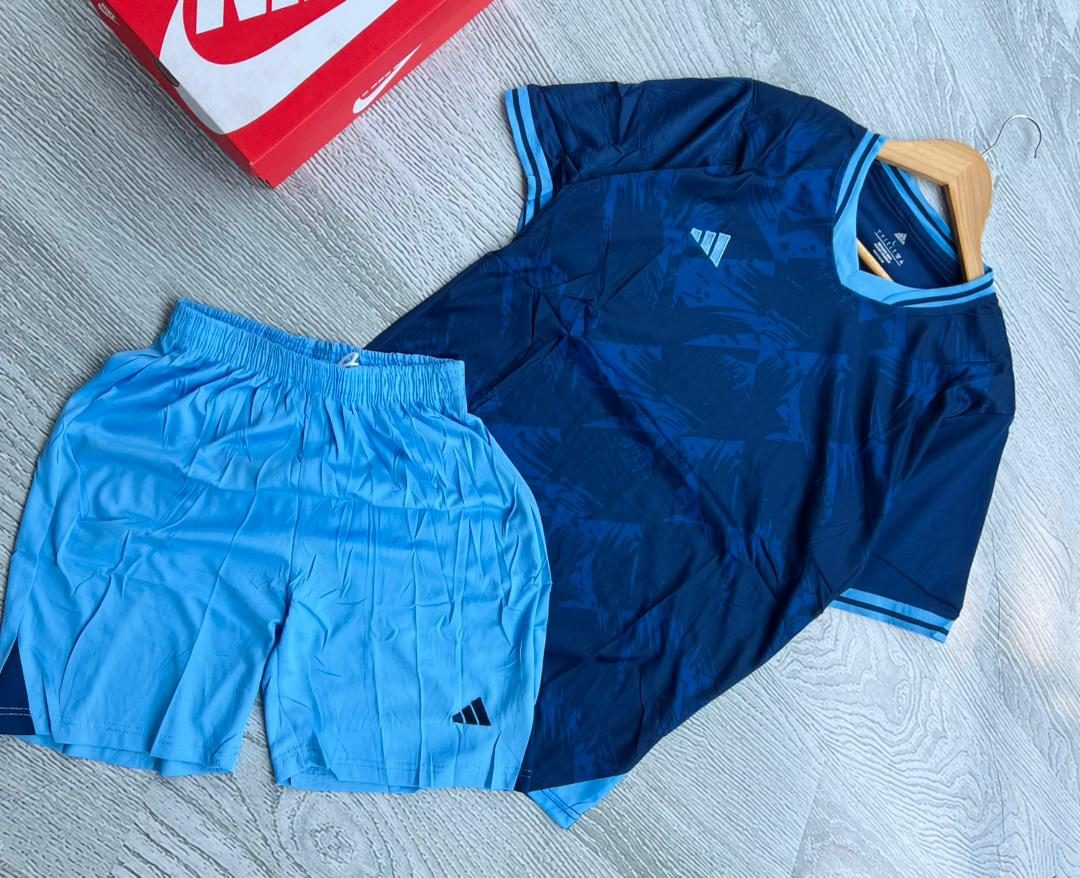 A blue sports jersey kit produced for a team